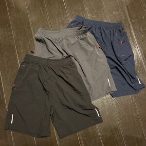 3 athletic shorts: Navy, black, gray